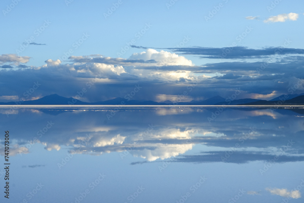 Distance Mountain and Cloud Reflections on the Salt Flats - Salar de Uyuni, Bolivia 