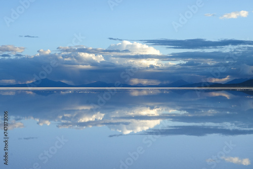 Distance Mountain and Cloud Reflections on the Salt Flats - Salar de Uyuni, Bolivia 