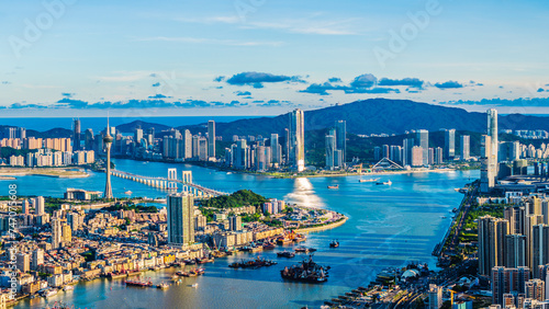Aerial view of Zhuhai and Macau city skyline with modern buildings scenery at sunset, China. High Angle view.
