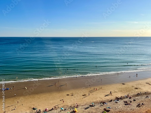 Blue ocean horizon, sandy beach, seascape background © Oksana
