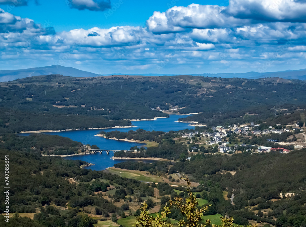 Panoramic view of Viana do Bolo surrounded by the waters of the O Bao reservoir. Ourense, Galicia, Spain.