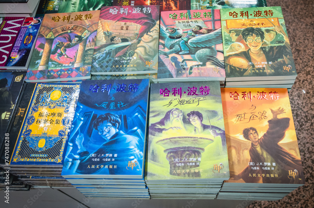 Obraz premium Beijing, China - March 26, 2013: Harry Potter books in Multi-storey Wangfujing Xinhua Bookstore at Wangfujing Street in Beijing