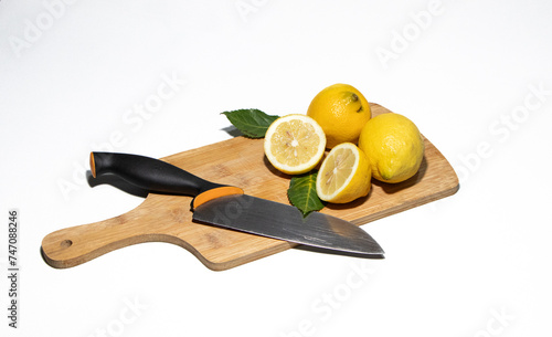 sliced lemon on a cutting board photo