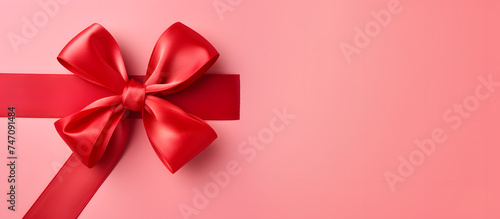 Sweet love heart with ribbon on red background