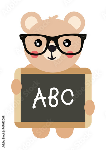 Teddy bear  teacher holding a school blackboard with abc written photo