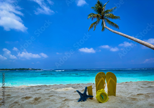 Fototapeta Naklejka Na Ścianę i Meble -  Yellow color with  tropical summer a holiday and accessories on the sand beach background