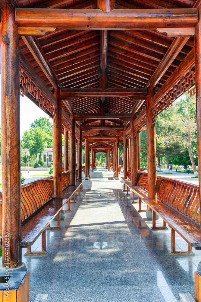 Traditional Chinese gazebo for relaxation in a summer public park Traditional Chinese gazebo for relaxation in a summer public park