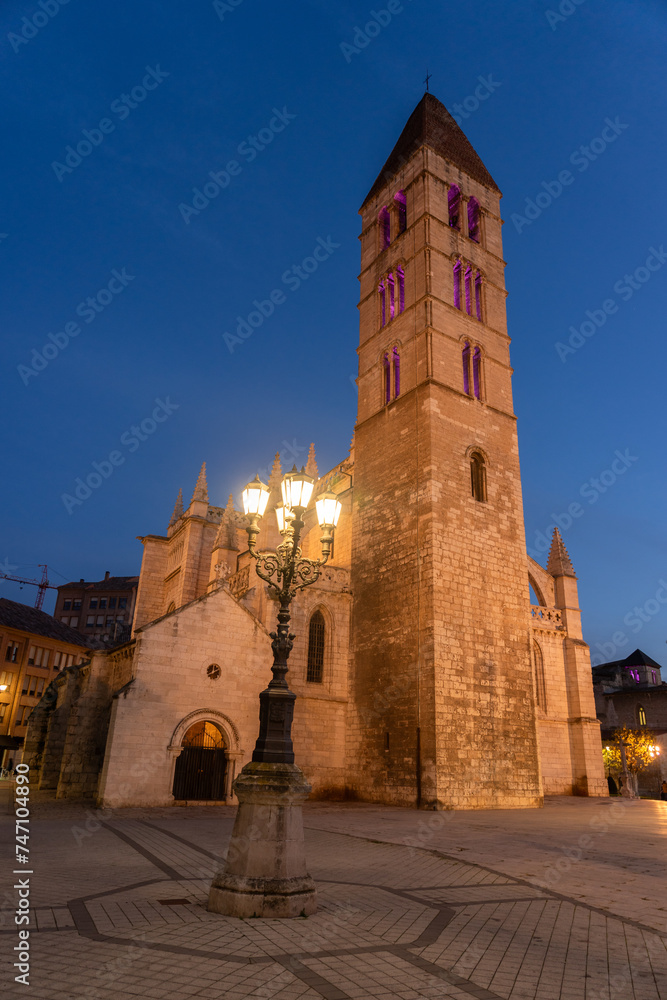 Santa Maria de la Antigua (Old) church in the old town of the city of Valladolid illuminated at night