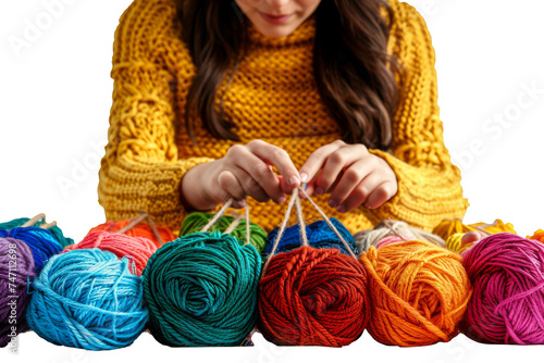 Creative Woman Hand-Crafting with Colorful Yarn Balls for Knitting on a White Background