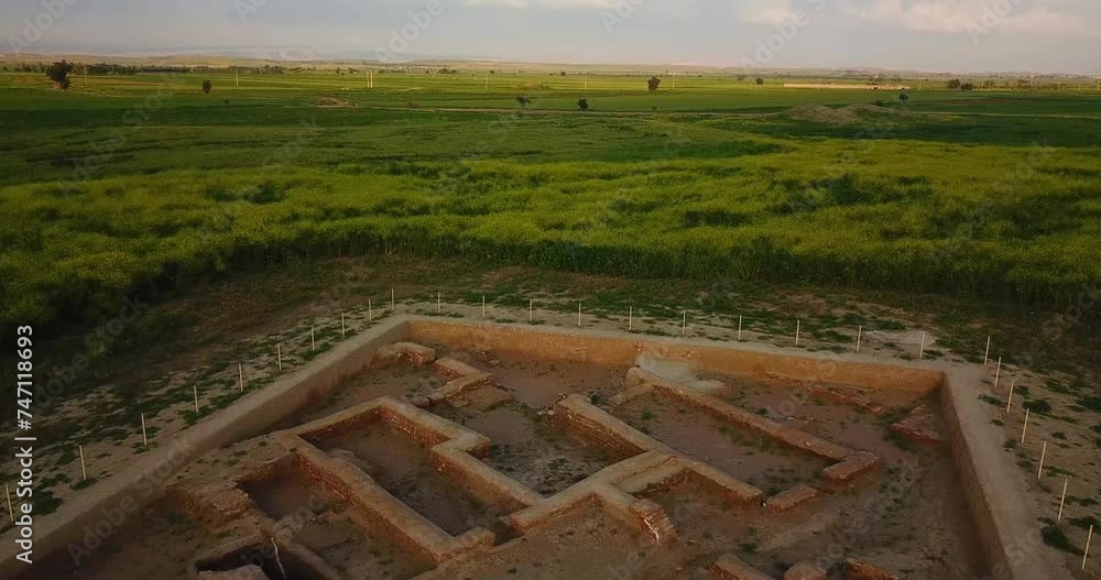 Fly over ancient historical Archaeological site the ruins of Gundeshapur Sassanian empire university school the traditional mud plan brick building in summer season wonderful lift off aircraft in iran Fly over ancient historical Archaeological site the ruins of Gundeshapur Sassanian empire university school the traditional mud plan brick building in summer season wonderful lift off aircraft in iran