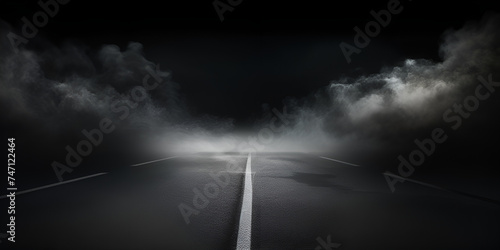 empty asphalt road with fog, Dark street, wet asphalt, reflections of rays on road. Abstract dark blue background, smoke, smog. Empty dark scene, neon light, spotlights photo