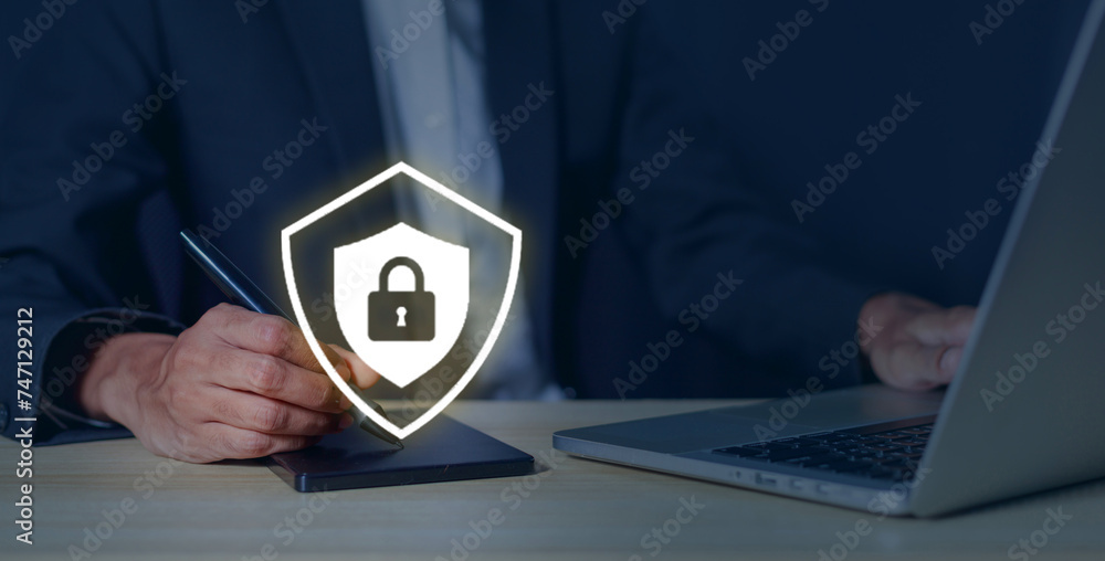Businessman protects network, cyber security system, sensitive data and network connection, internet technology, data protection and privacy concept.. Businessman protects network, cyber security system, sensitive data and network connection, internet technology, data protection and privacy concept..