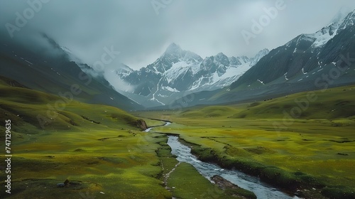 Moody River Valley Surrounded by Misty Mountains