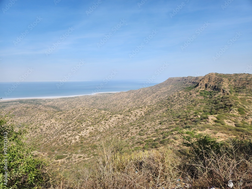 Fototapeta premium Kuran, Gujarat India - Feb 19 2024: Kalo Dungar - Kutch's highest point, featuring an old Hindu temple and views of a huge salt marsh.