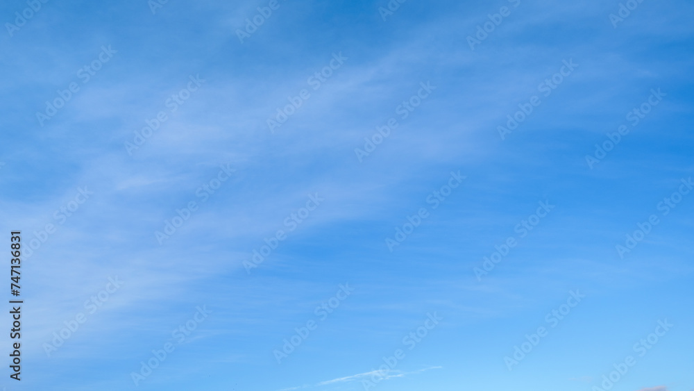 beautiful blue color sky and soft white clouds for abstract background