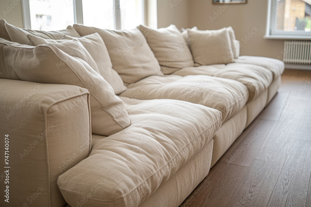 Obraz premium Comfortable living room with couch and window, perfect for interior design projects