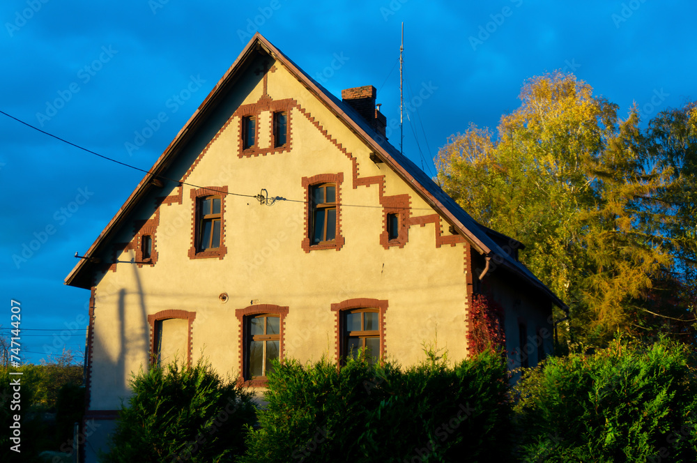 Former orphan boys' home. History of building dates back to 1892, side view, sunset. Ledziny, Poland.