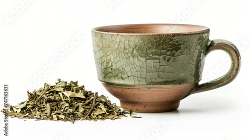 Ceramic Cup of Tea Next to a Pile of Dried