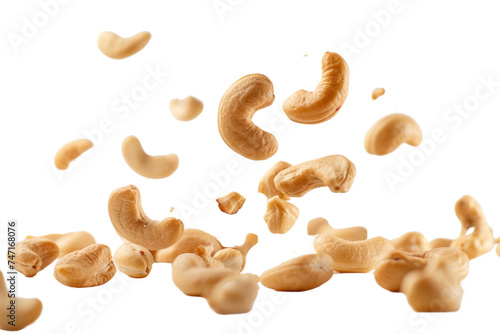 Falling cashew nuts on a transparent white background.