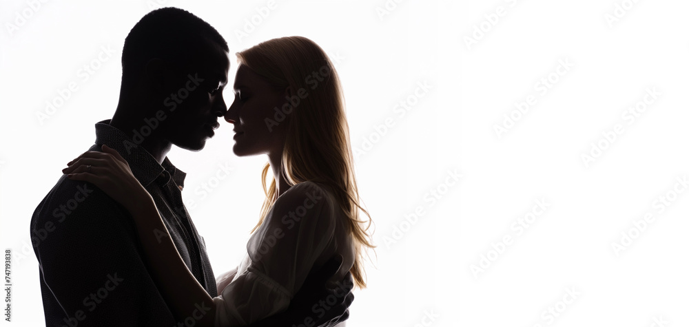 Black young man and blond woman. Interracial couple concept. Valentines day. Couple in love. Silhouette of a loving couple embracing. Touching foreheads. Leather jacket. Love, Diversity, inclusion