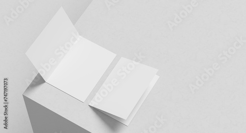 Bi fold brochure mock up isolated on white background. Bi fold paper mock up. 3D illustration photo