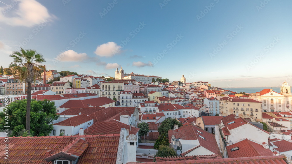 Panorama showing aerial view of Alfama in Lisbon timelapse during sunset.