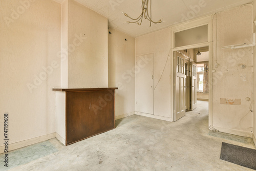 Empty room in need of renovation with vintage details