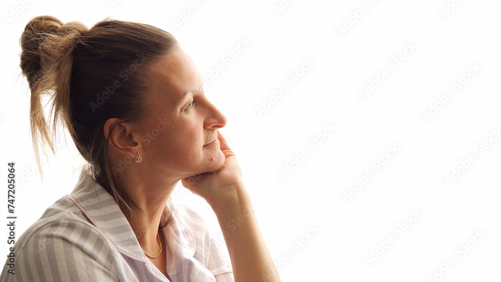 Woman with serene smile gazes contentedly out of window Woman's relaxed demeanor speaks volumes as she enjoys view beyond windowpane Her tranquil expression captivates as woman looks into distance Woman with serene smile gazes contentedly out of window Woman's relaxed demeanor speaks volumes as she enjoys view beyond windowpane Her tranquil expression captivates as woman looks into distance