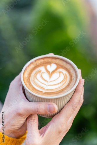 beautiful Latte art coffee with hot milk