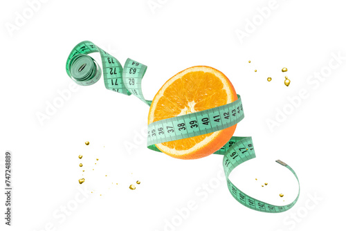 Orange fruit slice and measuring tape flying isolated on white background. Symbol of healthy dieting and control weight.
