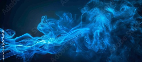 Creative abstract composition of blue smoke on a dark blue background, banner