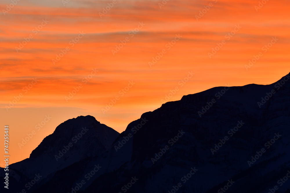 Mountain Peak landscape in orange sunset la Clusaz France