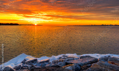 Sunset in winter over Amherst Island, on lake Ontario, Canada	