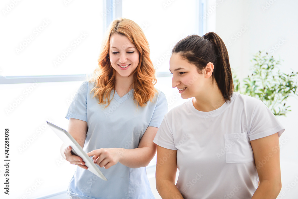 Modern rehabilitation physiotherapy at work with client Modern rehabilitation physiotherapy at work with client