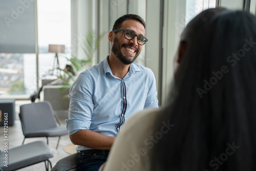 Business people having meeting in modern office photo