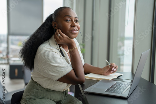 Photography Businesswoman with laptop working in modern office