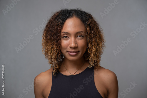 Portrait of woman with curly hair