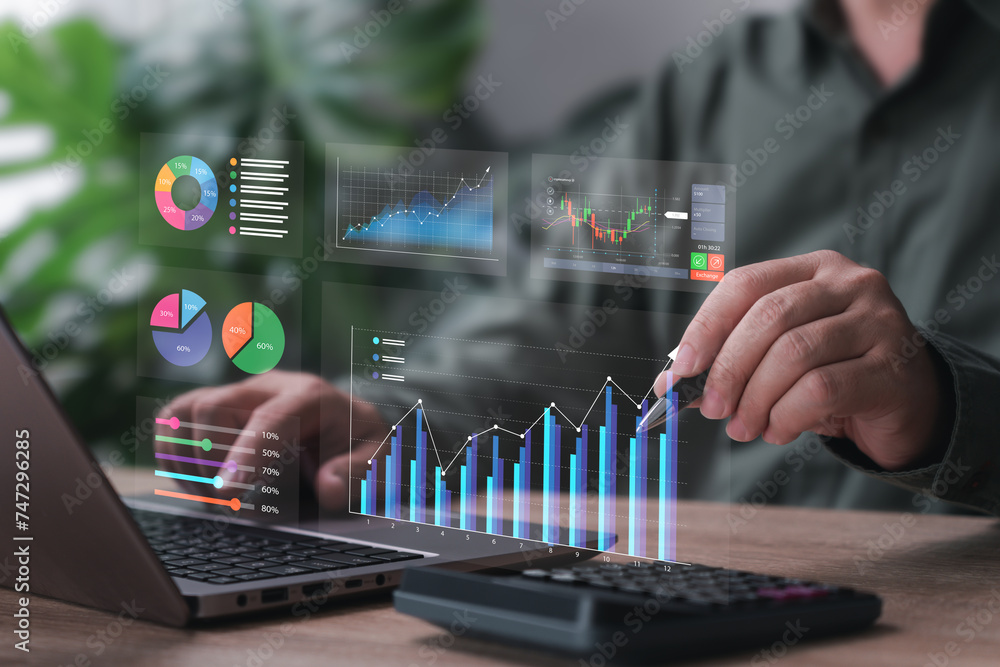 Business management, Smart digital marketing data analysis concept, Businessman use the laptop analysis chart strategic planning for sustainable development and financial and investment competition Business management, Smart digital marketing data analysis concept, Businessman use the laptop analysis chart strategic planning for sustainable development and financial and investment competition