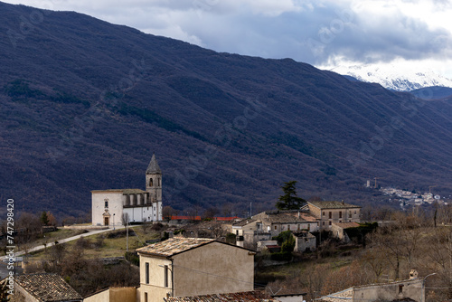 Beffi, Italy A small church in the village set in a mountainous landscape.