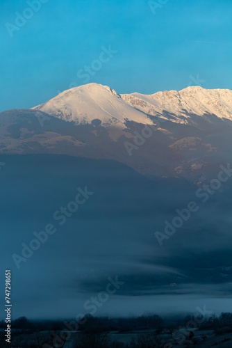 Castel di Ieri, Italy A landscape view over the Monte Sirente mountains and the Abruzzo National Park at dawn