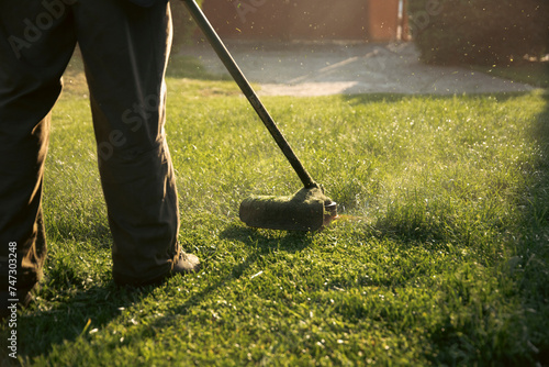 Lawn mover on green grass. Machine for cutting lawns.