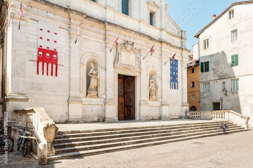 Entrance of the Church of Saints Paolino and Donato or San Paolino, in the historic center of Lucca, Tuscany, Italy photo