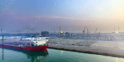 Container Cargo ship docked at the industrial port of Laem Chabang in Thailand photo