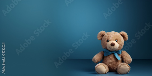 "cute cuddly teddy bear sits with a bow no backround" © Saim
