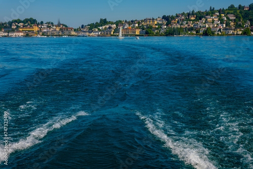 Rear View From a Nautical Vessel with Cityscape and Lake Lucerne in a Sunny Summer Day in Lucerne, Switzerland.