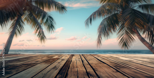 Tropical Beach Sunset with Palm Trees and top of old wood table, Calm Seascape, a Perfect Caribbean Vacation Landscape under the Warm Summer Sky. Copy space ready for your product or text.