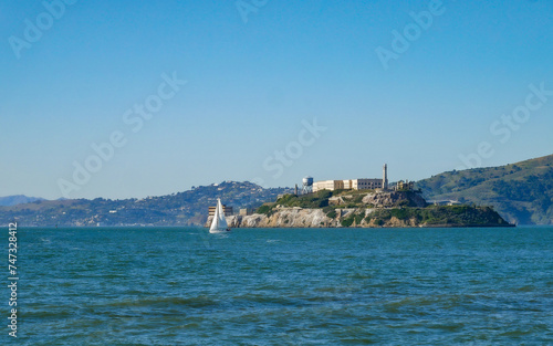 Beautiful View of Alcatraz with a Sailboat in San Francisco Bay