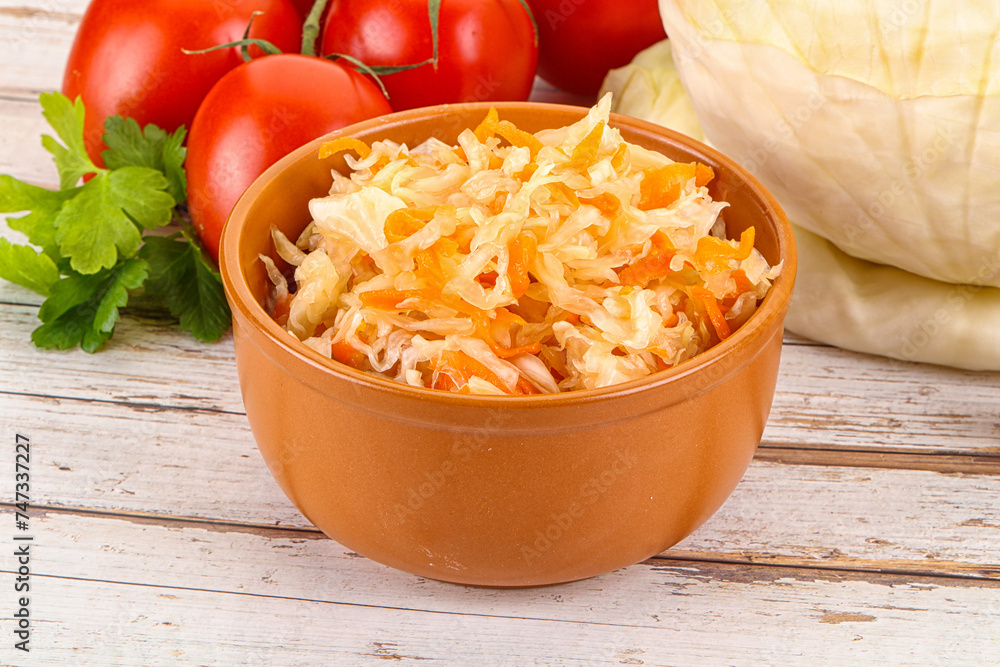 Fermented cabbage sauerkraut in the bowl Fermented cabbage sauerkraut in the bowl