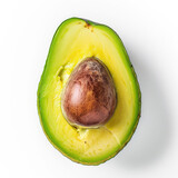 A ripe avocado cut in half, seed visible, on white background
