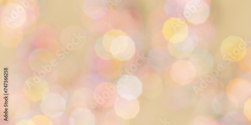 Golden peach color Defocused abstract bokeh background pastel tones, flare from lights, color gradient, blurred round bokeh as holiday texture. Glittering aesthetic textured lighting banner